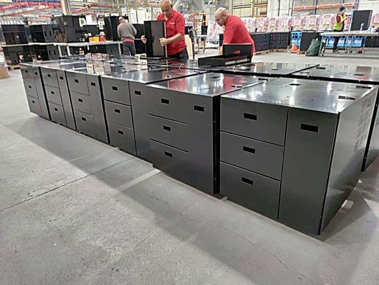 staff working on metal fabrication for vending industry (1) staff working on metal fabrication for vending industry (1)